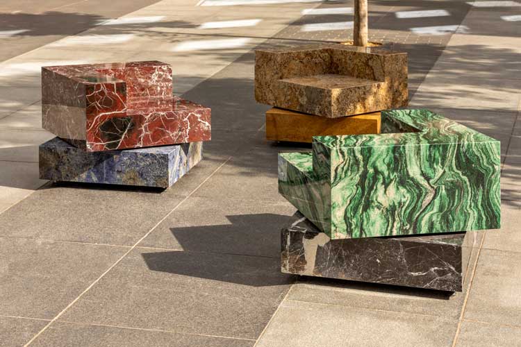 Sabine Marcelis, Swivel, 2022. Rotating stone chairs, installation view, Centre Point, St Giles Square, London. Photo: Ed Reeves.