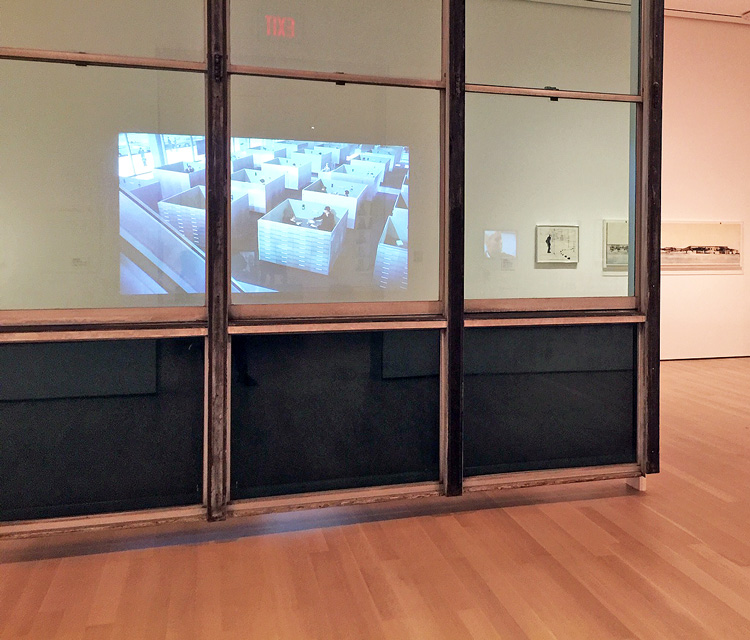 Jacques Tati. Excerpt from Playtime, 1967, viewed through the glass facade from the United Nations Secretariat Building, New York, 1952. Photo: Jill Spalding.
