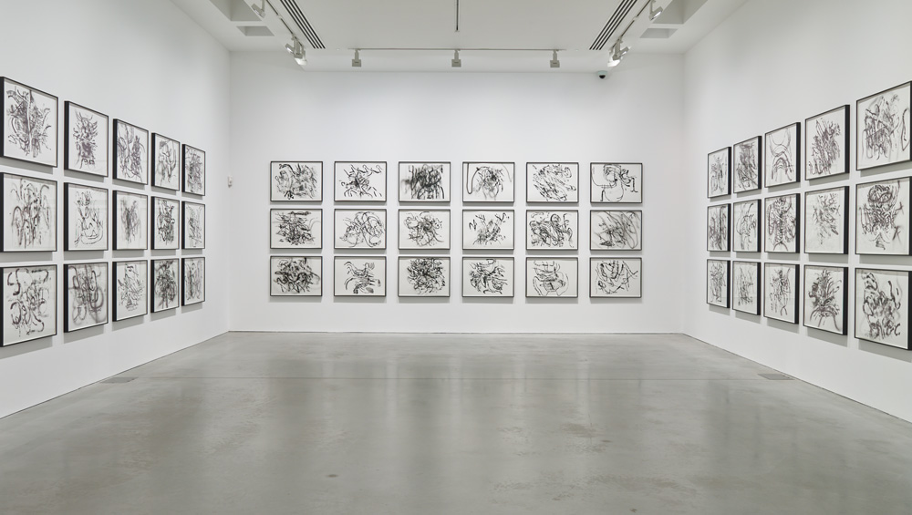 Julie Mehretu. Monotype #19, 2018. Monotype with printer ink and occasional acrylic on Hahnemuhle Copperplate 300gsm, 55.9 x 73.7 cm. © Julie Mehretu. Photo © Rebecca Fanuele.