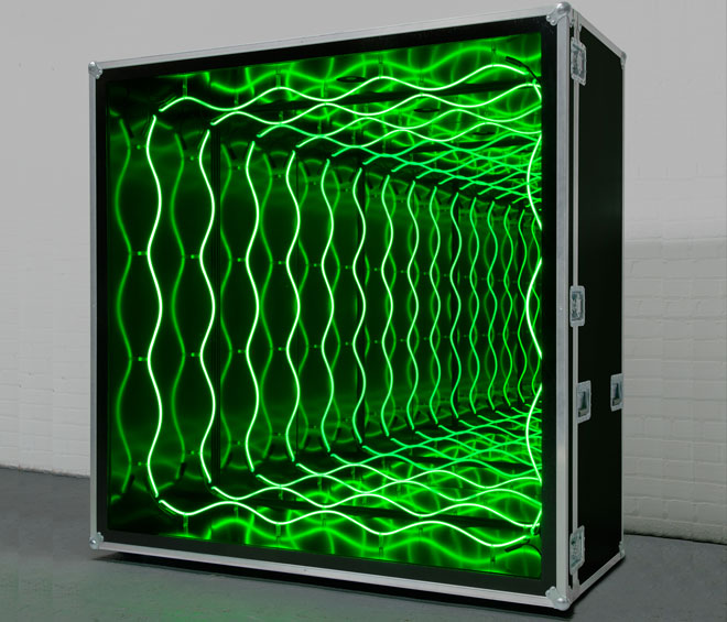 Iván Navarro. Impenetrable Room, 2016. Neon, aluminium, mirror, one-way mirror and electric energy, 72 × 72 × 30 in (182.9 × 182.9 × 76.2 cm). Image courtesy of the artist and Paul Kasmin Gallery. Photograph: Christopher Stach.