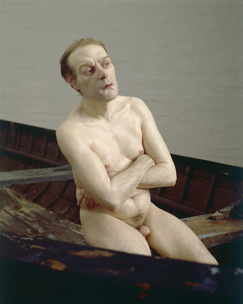 Ron Mueck. Man in a Boat, 2002. Mixed media. Man: (height) 75cm Boat: (length) 427cm © Ron Mueck, courtesy Anthony d'Offay, London. Photographer: Mike Bruce, Gate Studios, London.