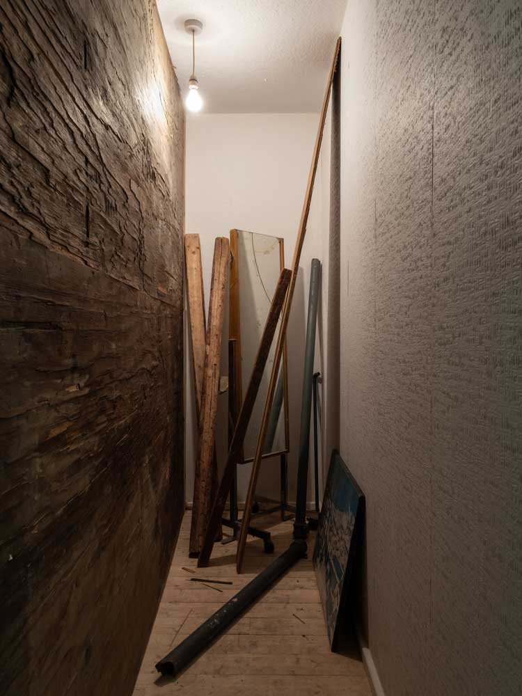 Mike Nelson: Humpty Dumpty, low rise, installation view, Fruitmarket Warehouse, Edinburgh, 2025. Photo: Tom Nolan.