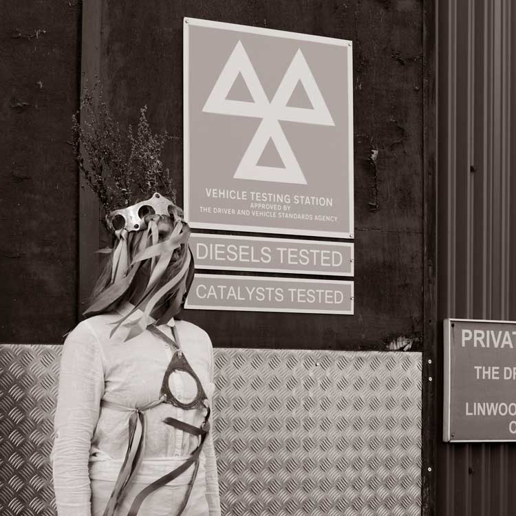 Libby Bove, So turns the wheel of the M.O.T. - A Journey through the imagined history of folk customs associated with the annual vehicle safety test, 2023. Photographic installation with sound. Courtesy of the Artist.