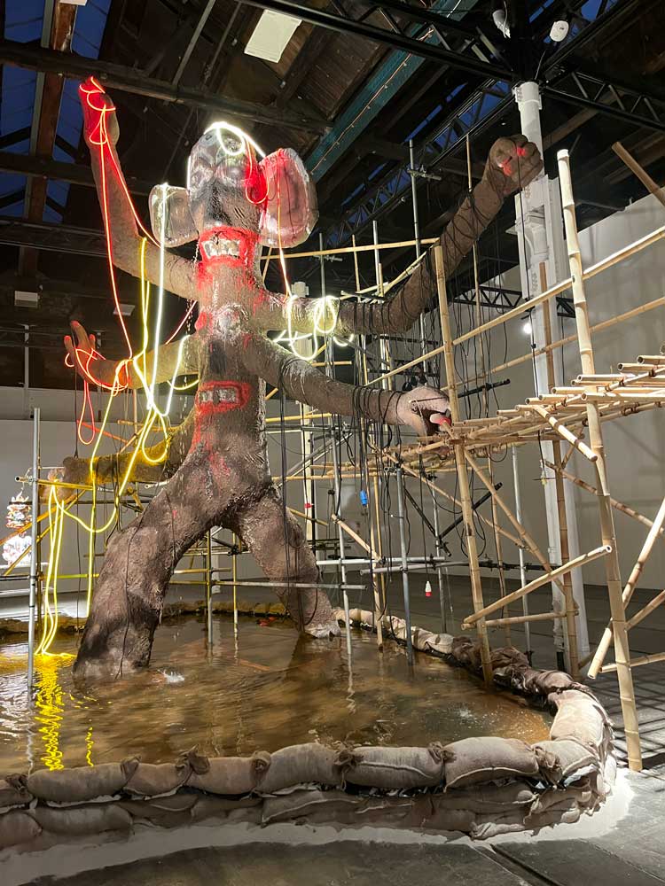 Ramesh Mario Nithiyendran. Multi Limbed Mud Fountain, 2023, installation view, Ramesh Mario Nithiyendran: Idols of Mud and Water, Tramway, Glasgow, 2023. Photo: Veronica Simpson.