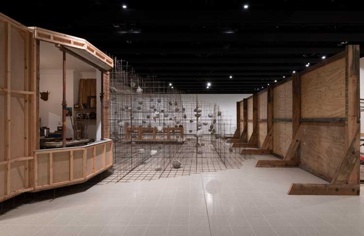Installation view of Mike Nelson, Studio Apparatus for Kunsthalle Münster, 2014. Various materials. Triple Bluff Canyon (the projection room), 2004. Various materials. Photo: Matt Greenwood. Courtesy the artist and the Hayward Gallery.