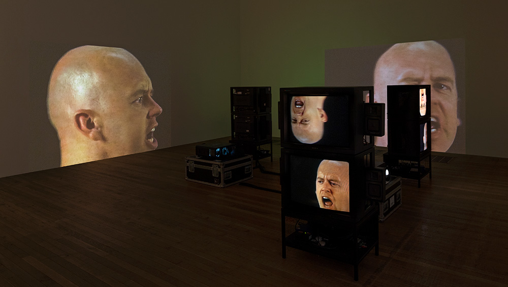 Bruce Nauman. Black Marble Under Yellow Light, 1987. Installation view, Tate Modern. Photo: Tate Photography (Matt Greenwood). Artwork © Bruce Nauman / ARS, NY and DACS, London 2020.