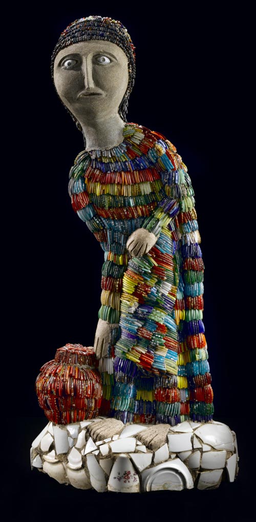 Nek Chand (b. 1924). Lady Fetching Water, c. 1984. Concrete over metal armature with mixed media 32 x 11 x 4 in. Collection American Folk Art Museum, New York. Gift of The National Children's Museum in honor of Gerard C. Wertkin 2004.25.11. Photo by Gavin Ashworth.