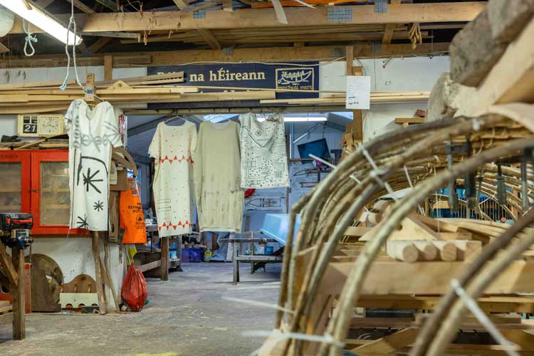 Garments from Ceyda Oskay’s clothing brand, cc by co, created for In From the Margins, hung in 2022 in the boatbuilding workshop Meitheal Mara Teoranta in Cork.
Photo courtesy John Beasley, Cork, 2022.