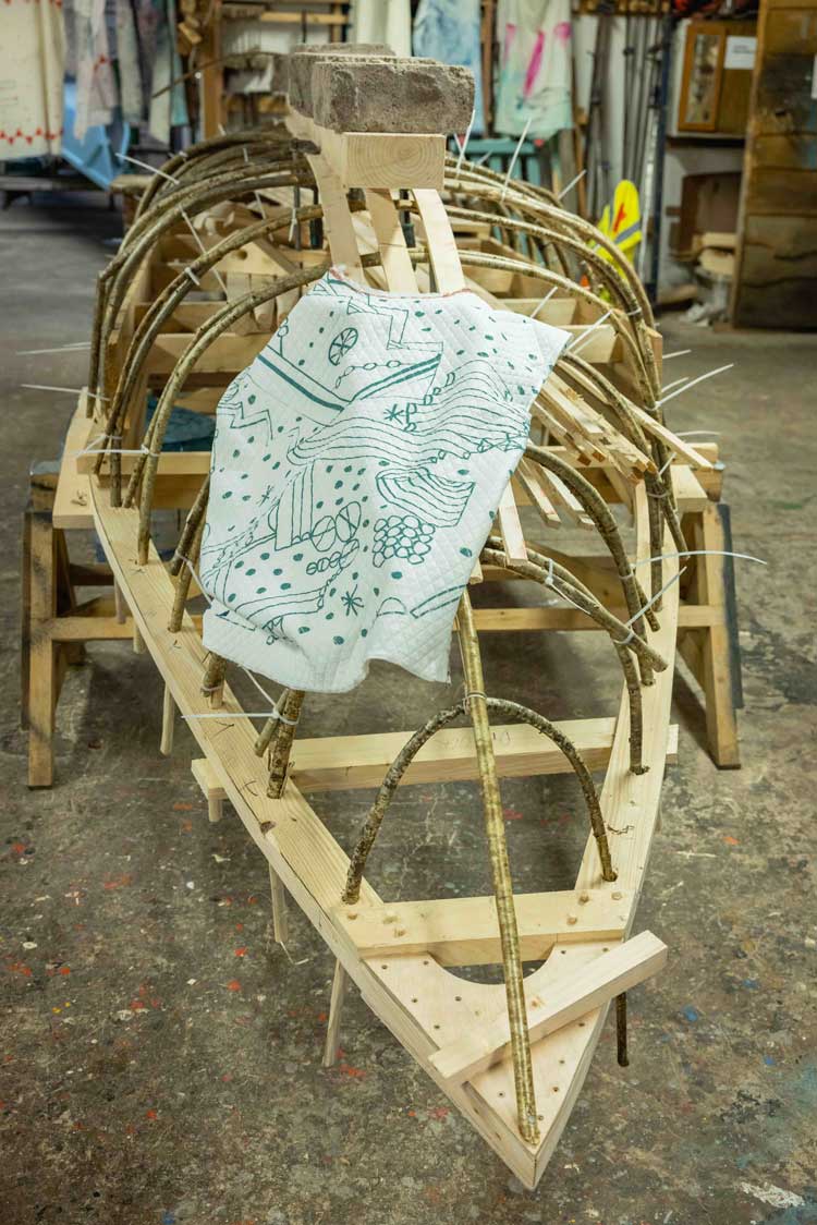 Printed shirt on a boat frame at Meitheal Mara Teoranta boatyard, 2022. Shirt created for In From the Margins, from Ceyda Oskay’s clothing brand, cc by co.
Photo courtesy John Beasley, Cork, 2022.