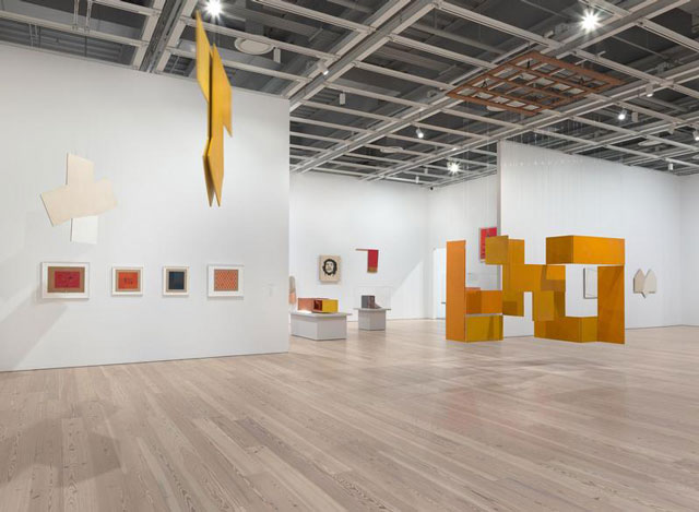 Installation view of Hélio Oiticica: To Organise Delirium (Whitney Museum of American Art, New York, July 14–October 1, 2017). From left to right, top to bottom: P41 Bilateral, Teman (P41 Bilateral, Teman), 1959; P52 Spatial Relief (P52 Relevo espacial), 1960; Grupo Frente, ca. 1955; Grupo Frente, ca. 1955; Grupo Frente 136, 1956; Grupo Frente 73, 1955-56; Grupo Frente, ca. 1955 P31 Parangolé Cape 24, Escrerbuto, 1972; B16 Box Bólide 12, Archaeological (B16 Bólide caixa 12, Arqueológico), 1964-65; P20 Parangolé Cape 16, Guevarcália (P20 Parangolé capa 16, Guevarcália), 1968; B33 Box Bólide 18, Homage to Cara de Cavalo (B33 Bólide caixa 18 Homenagem á Cara de Cavalo), 1965-66; NC6 Medium Nucleus 3 (NC6 Núcleo médio 3), 1961-63; P34 White Painting (P34 Série branca), 1959. Photograph by Ron Amstutz