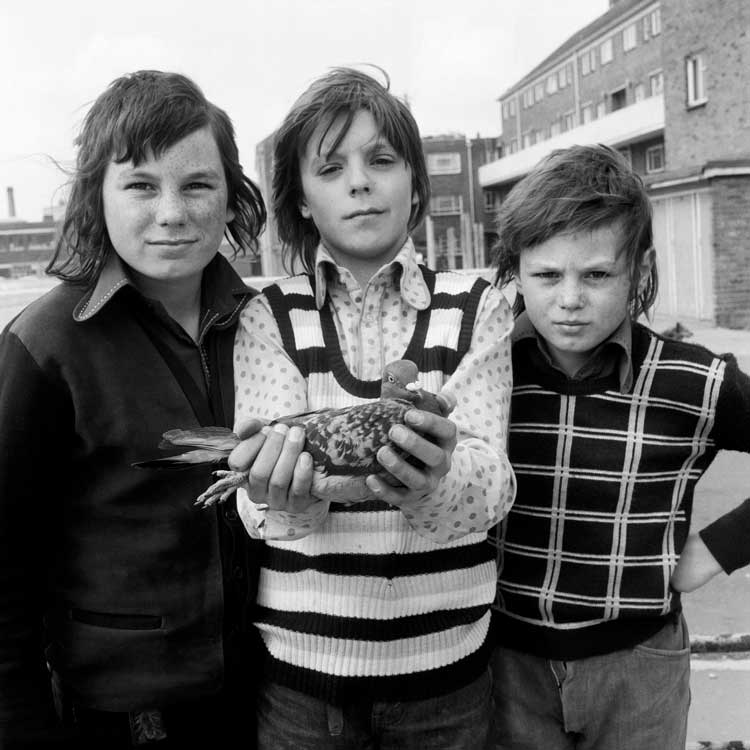 John Payne, aged 12, with friends and his pigeon Chequer. Portsmouth, 1974. © Daniel Meadows. Courtesy the artist and Bodleian Libraries, University of Oxford.