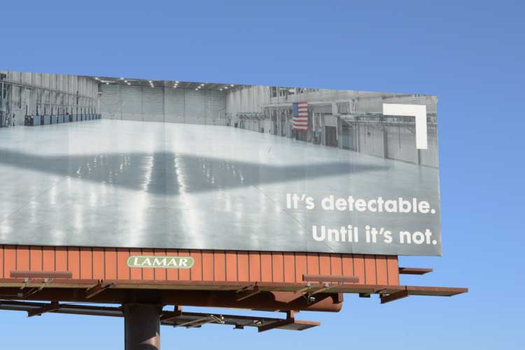 Center for Land Use Interpretation Remote Sensing: Explorations Into the Art of Detection. Billboard along Highway 14 in the Antelope Valley, north of Los Angeles, California, 2022. Digital photograph. © Copyright Center for Land Use Interpretation.