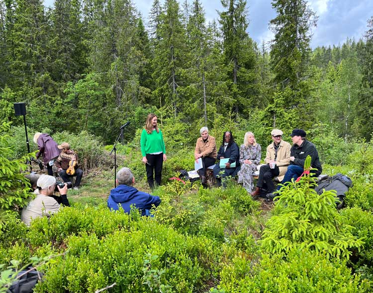Future Library 2022. Speeches in the forest, Left to right: public art curator Anne Beate Hovind, Karl Ove Knausgård, Tsitsi Dangarembga, Katie Paterson, Sjón and David Mitchell. Photo: Veronica Simpson.
