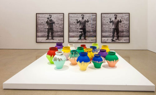 Ai Weiwei: According to What?. From top to bottom: Dropping a Han Dynasty Urn, 1995/2009; Coloured Vases, 2007-2010. Installation view Pérez Art Museum Miami. Photograph: Daniel Azoulay photography.