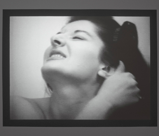 Marina Abramović. Art must be beautiful/Artist must be beautiful, 1975. Black and white video with sound,
13 min 51 sec. © Marina Abramović; Courtesy Lisson Gallery.