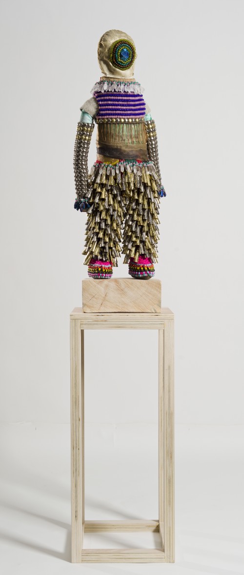 Jeffrey Gibson. Here It Comes, 2014. Deer rawhide, glass and plastic beads, wool blanket, beetle wings, artist’s own repurposed painting, artificial sinew, Drusy quartz, steel and brass studs, 37 ½ x 13 ½ x 6 ½ in. Courtesy of the artist and Samsøn, Boston, MA & MARC STRAUS, New York.