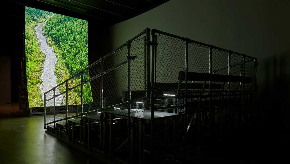 Lucy Raven, Murderers Bar, 2025. Installation view, The Curve, 9 October 2025 – 4 January 2026. © Jo Underhill, Barbican Art Gallery.