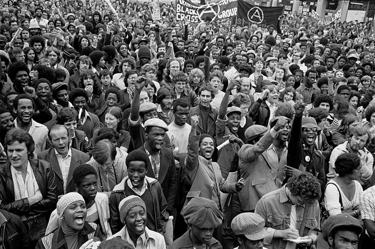 Paul Trevor. Anti-racists gather to block route of National Front demonstration, New Cross Road, London, August 1977. © Paul Trevor.