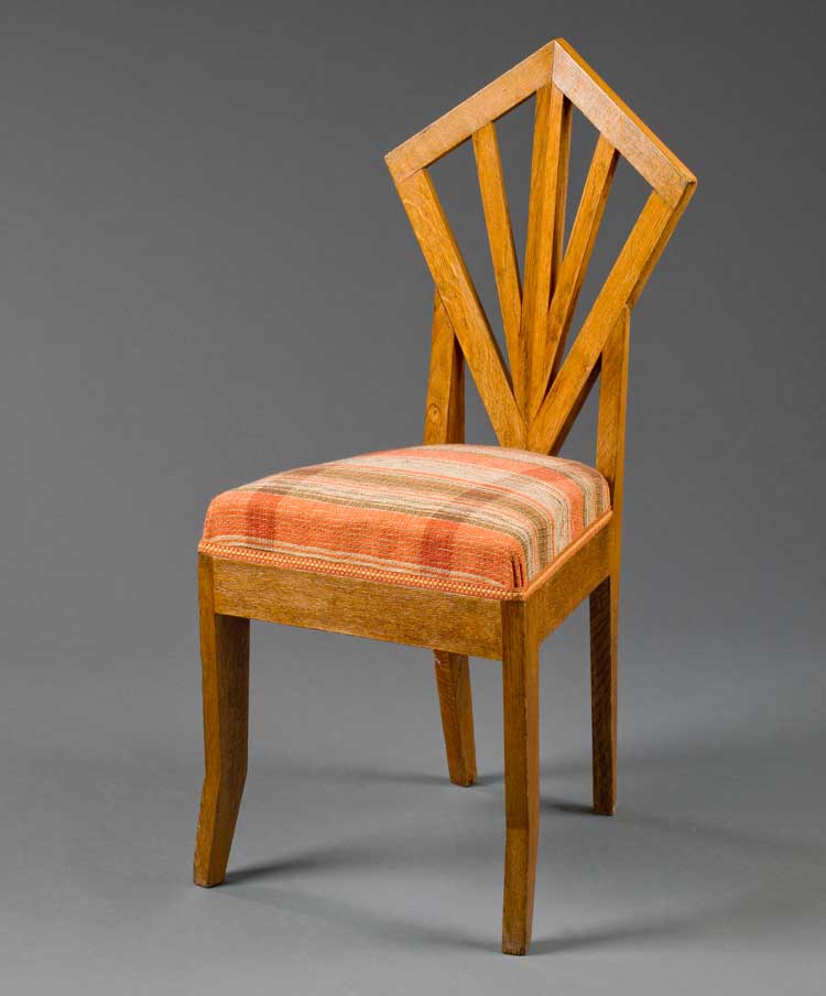 Pavel Janák. Cushioned chair. Realisation: Prague art workshops (PUD). The Museum of Decorative Arts in Prague.