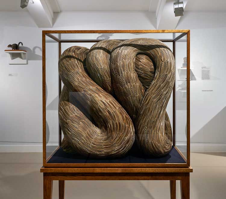 Kate MccGwire. Gyrus, 2019. Mixed media with pheasant feathers in bespoke cabinet, 160 x 100 x 60 cm. © Kate MccGwire.