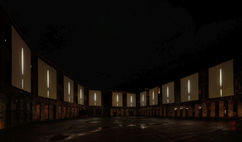 Clifford Ross. Nighttime view of immersive Harmonium Mountain video. Courtyard D. MASS MoCA.