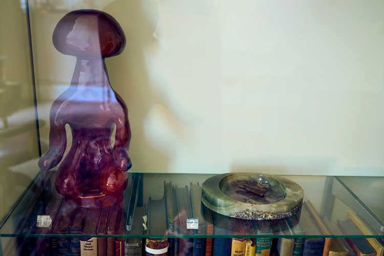 Holly Stevenson, The Witness, 2025, ceramic: glazed stoneware with Freud's favourite ashtray, the green oval dish; Museum reference number 3111. Installation view, Holly Stevenson, Tracing The Irretraceable, The Freud Museum, 2025.