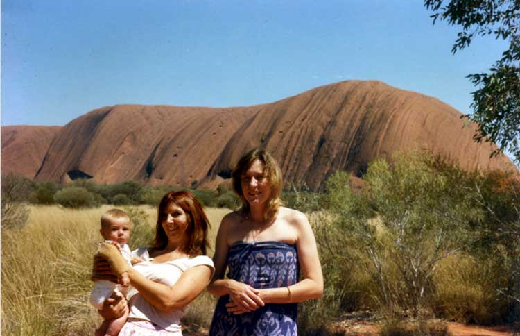 Jill Smith with her son Taliesin and Lynne Wood at Uluru, also known as Ayers Rock, Australia.