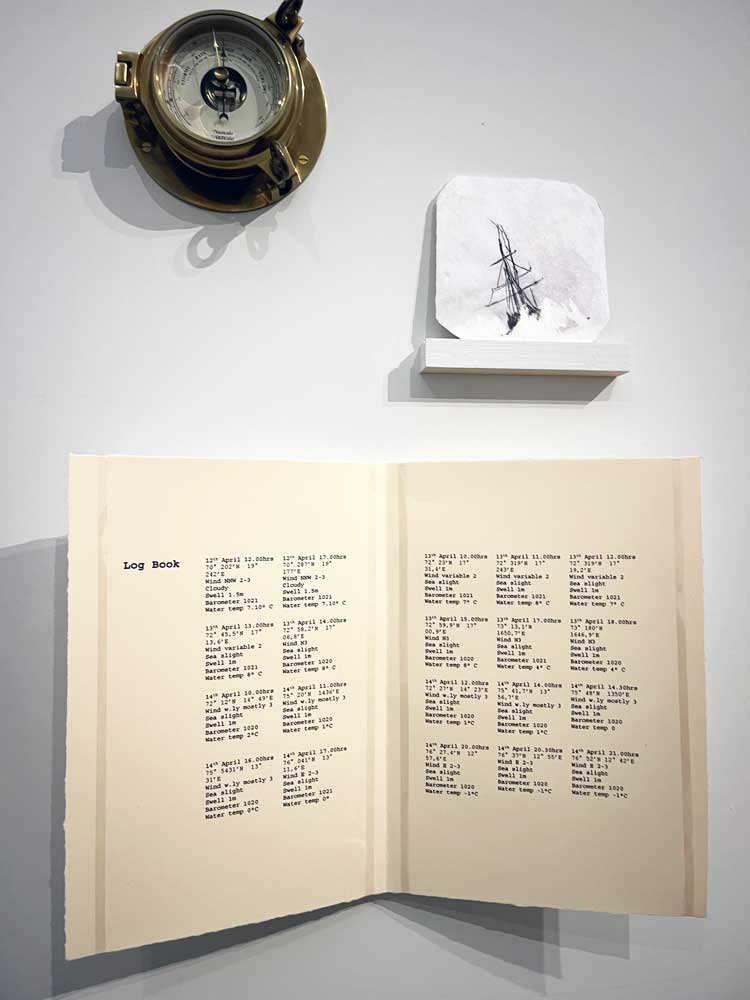 Map, barometer and ship's log showing locations of drawings made during Barents Sea Passage journey, 2022. Installation view, Emma Stibbon: Melting Ice | Rising Tides, Towner Eastbourne, 2024.