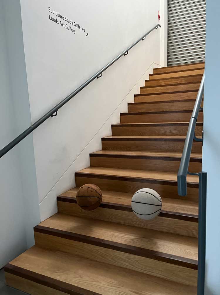 Michael E Smith, Untitled, 2023. Basketballs, stairs. Installation view, Henry Moore Institute, Leeds. Photo: Veronica Simpson.
