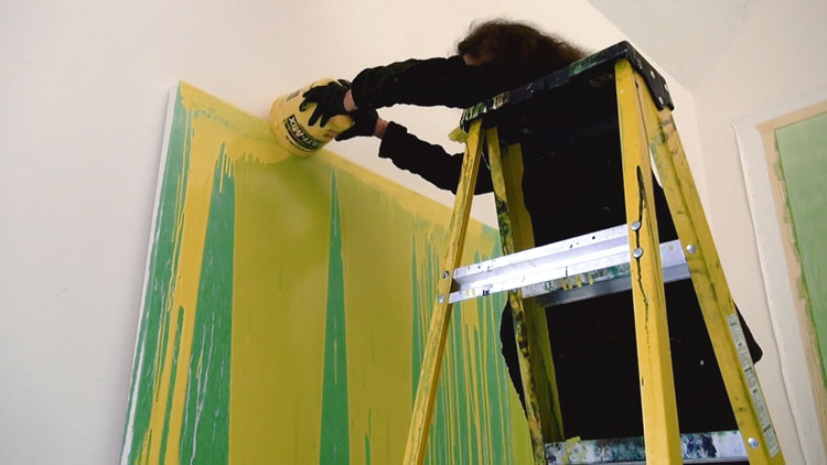 Pat Steir working in her studio. Photo: Molly Davies.