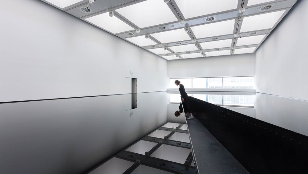 Richard Wilson, 20:50, 1987. Installation view at Space Shifters. © copyright the artist, courtesy Hayward Gallery 2018. Photo: Mark Blower.