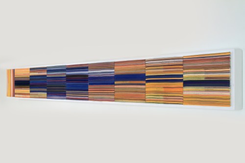 Hadieh Shafie. Stripe 2, 2014. Ink, acrylic and paper with printed and handwritten Farsi text Eshgh (Love/Passion), 11 x 68 x 4.5 in (31 x 223.5 x 11.4 cm). Courtesy of the artist and Leila Heller Gallery, New York. Photograph: Jason Fagan.