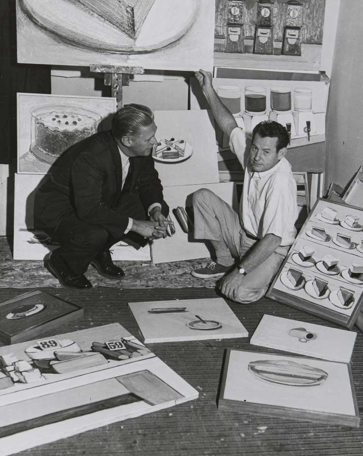 Wayne Thiebaud in his studio in Sacramento with Professor Paul Beckmann, 1962. Collection of the Wayne Thiebaud Foundation. © Wayne Thiebaud / VAGA at ARS, NY and DACS, London 2025.