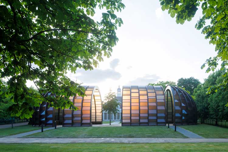 Serpentine Pavilion, 2025, A Capsule in Time, designed by Marina Tabassum, Marina Tabassum Architects (MTA). Exterior view. © Marina Tabassum Architects (MTA), Photo: Iwan Baan, Courtesy, Serpentine.