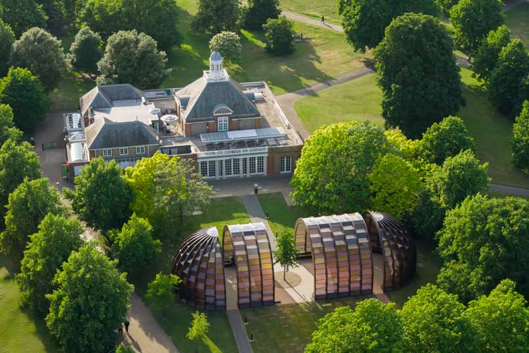 Serpentine Pavilion, 2025, A Capsule in Time, designed by Marina Tabassum, Marina Tabassum Architects (MTA). Exterior view. © Marina Tabassum Architects (MTA), Photo: Iwan Baan, Courtesy, Serpentine.