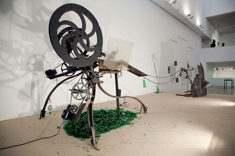Jean Tinguely. Rotozaza n°2, 1967. Welded scrap iron, Plexiglas, bicycle chain, 110V electric motor, 230 x 800 x 400 cm. Museum Tinguely Basel. The Museum Tinguely is a cultural commitment of Roche. © Museum Tinguely, Basel. Jean Tinguely by SIAE, 2023. Photo: Bettina Matthiessen.