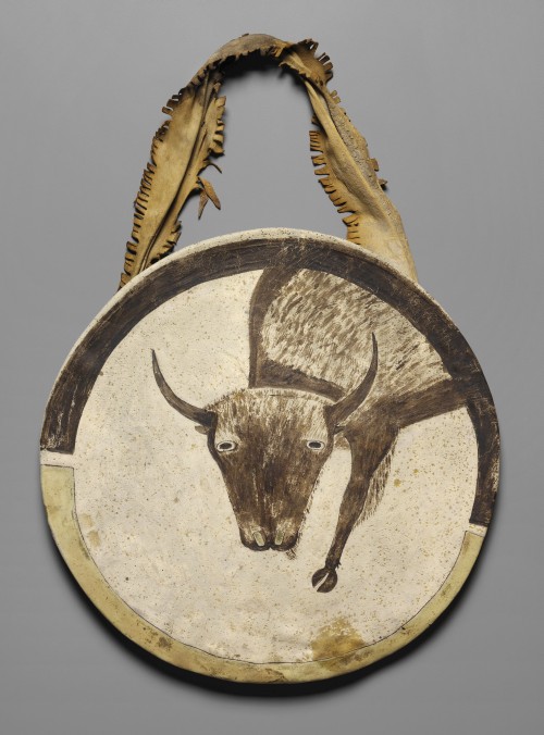 Shield, c1850. Arikara artist, North Dakota. Buffalo rawhide, native tanned leather, pigment, 20 in (50.8 cm) diameter. Kansas City (Missouri), The Nelson-Atkins Museum of Art, Purchase: the Donald D. Jones Fund for American Indian Art. Photograph: The Nelson-Atkins Museum of Art/Jamison Miller. (Cat.55).