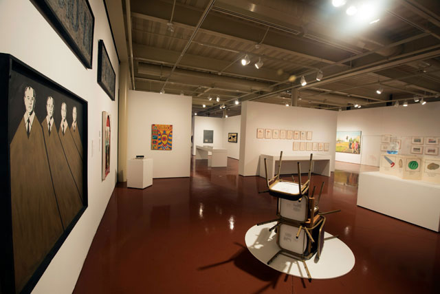 Installation View: Thinking Pictures: Moscow Conceptual Art at the Dodge Collection at the Zimmerli Art Museum at Rutgers. Includes: Viktor Skersis’ One and Three Chairs (Reconstruction), 1979/2016, Constantin Latyshev’s painting Gorbachev’s Brothers, 1988, and others. Photo Credit: Peter Jacobs.