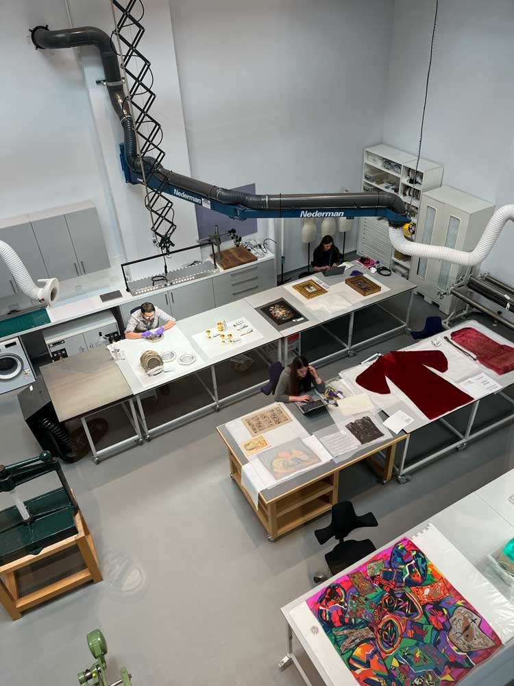 The conservators at work viewed from the viewing platform above. Photo: Veronica Simpson.