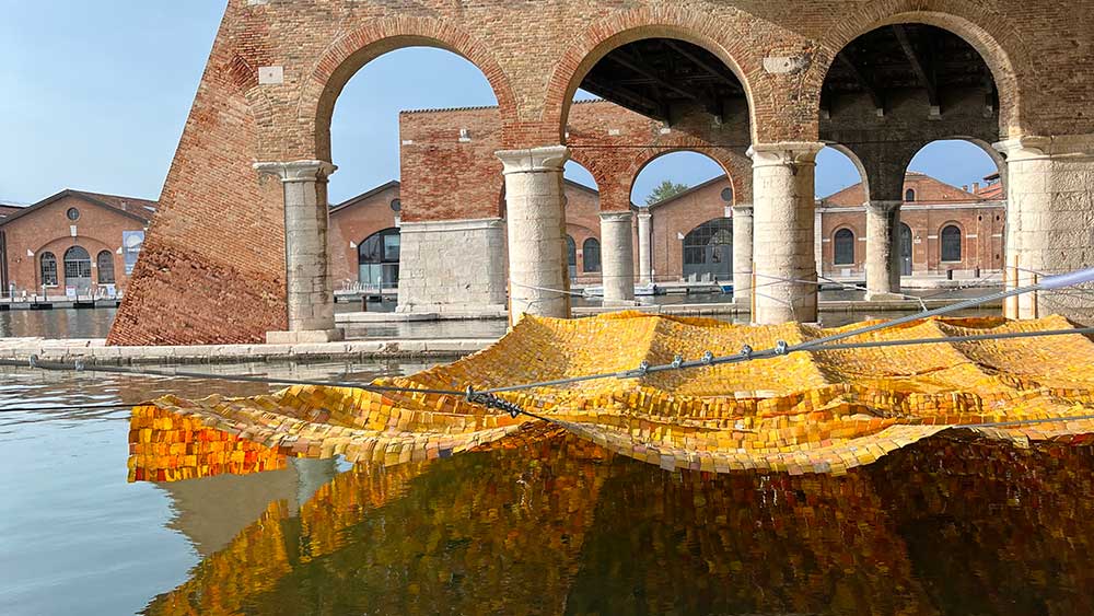 Serge Attukwei Clottey hung two structures made from plastic gallon bottles inside and outside the Arsenale. Photo: Veronica Simpson.