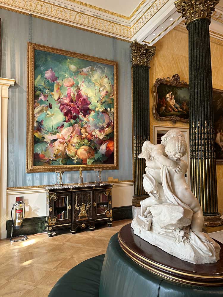 Installation view of Flora Yukhnovich's painting A World of Pure Imagination, 2024, Wallace Collection, London. Photo: Martin Kennedy.