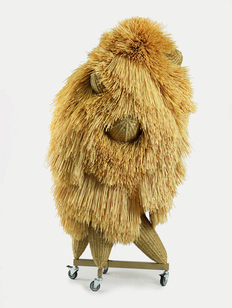 Haegue Yang. The Intermediate – Tilted Bushy Lumpy Bumpy, 2016. Artificial straw, powder-coated steel frame, powder-coated mesh, casters, 203 x 120 x 120 cm. Marc and Annette Kemmler Collection. Photo: Studio Haegue Yang.